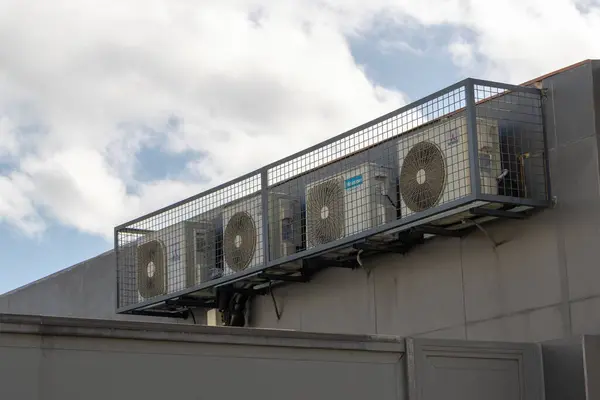 depositphotos 761186434 stock photo several air conditioning units installed